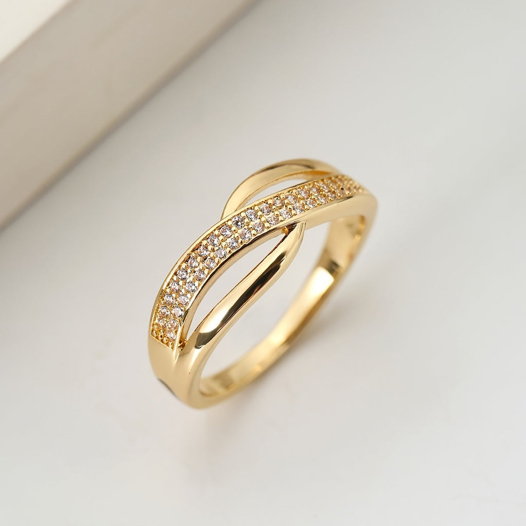 Elegant Gold-Colored Crossover Ring with Stones