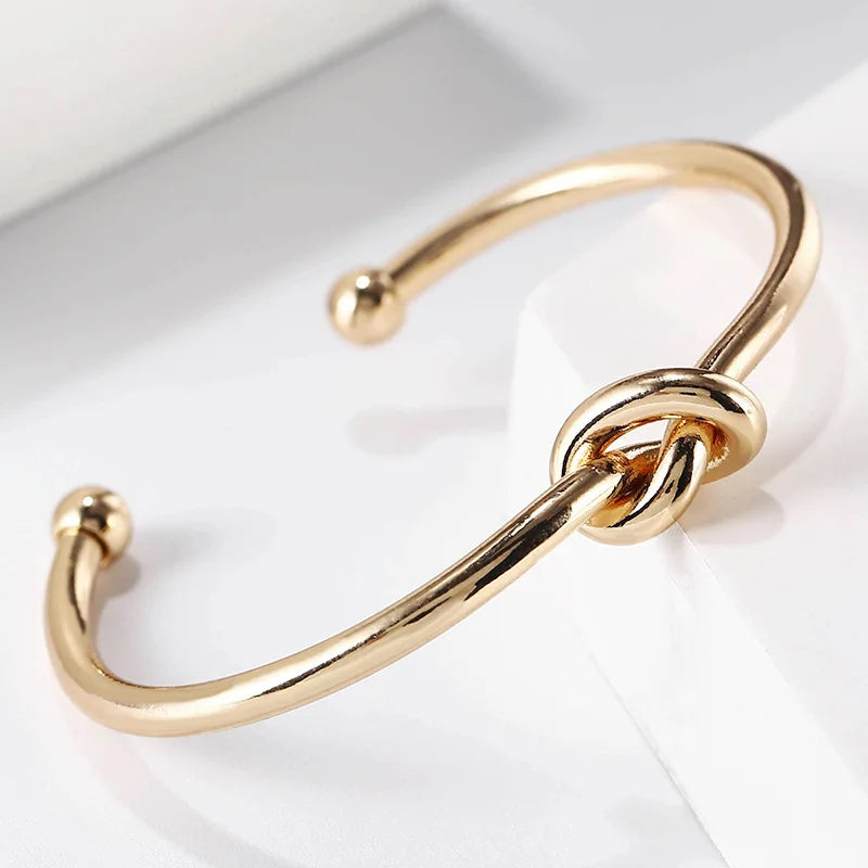 Golden Bracelet with Knot Detail
