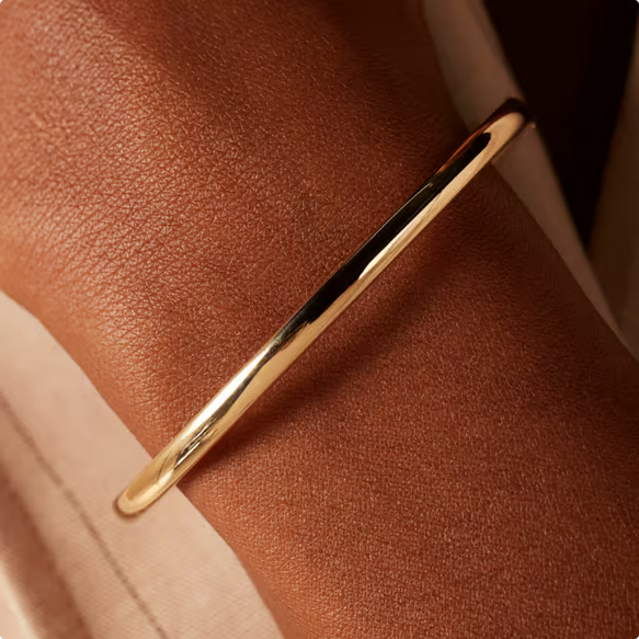 Golden Bracelet with Knot Detail