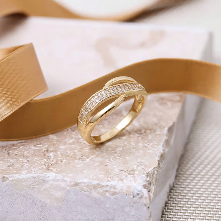 Elegant Gold-Colored Crossover Ring with Stones